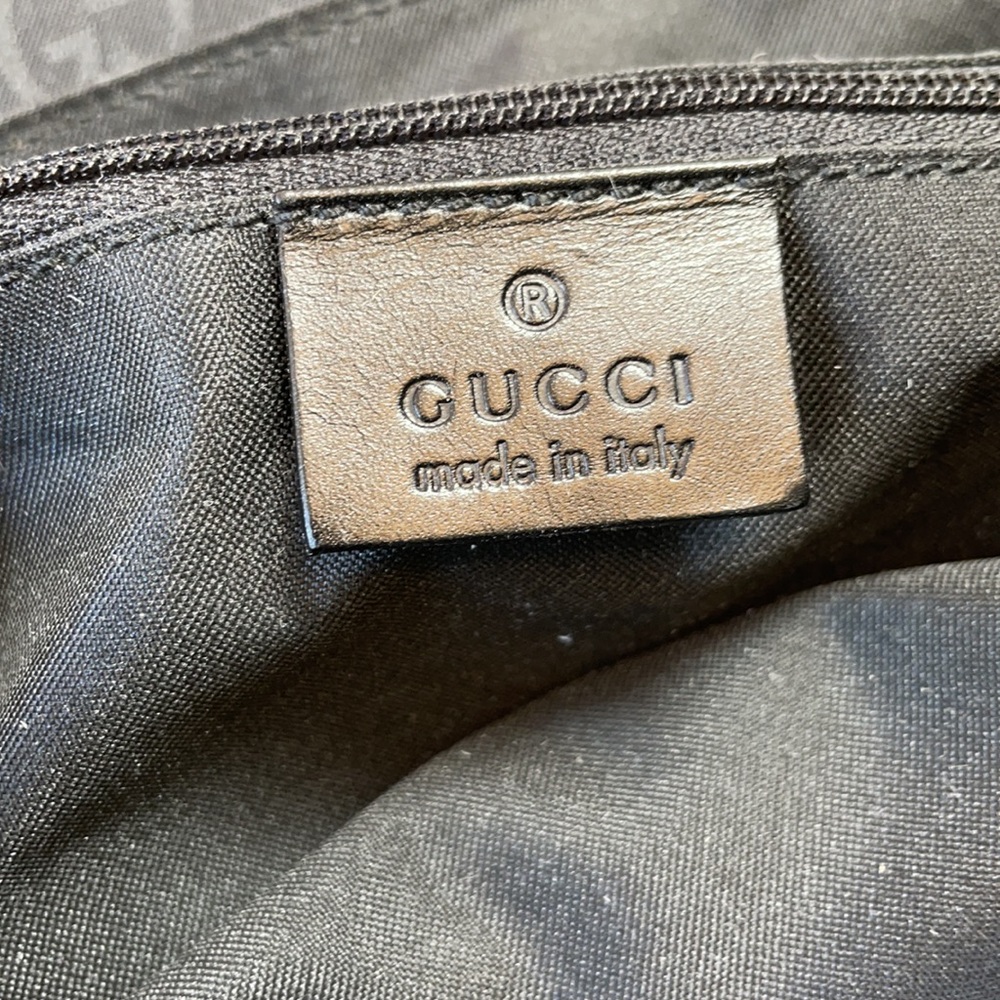 GUCCI NWOT Monogram Drawstring Backpack - Picture 10 of 12